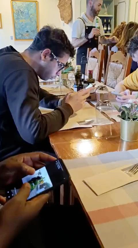 Team members recording finds at a table