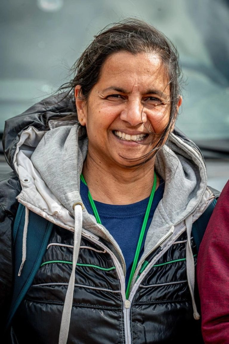 Portrait of a smiling team member in the field